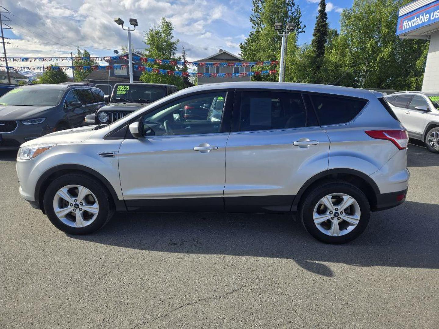 2015 SILVER FORD ESCAPE SE (1FMCU9GX5FU) with an 1.6L engine, Automatic transmission, located at 929 East 8th Ave, Anchorage, AK, 99501, (907) 274-2277, 61.214783, -149.866074 - Photo#1
