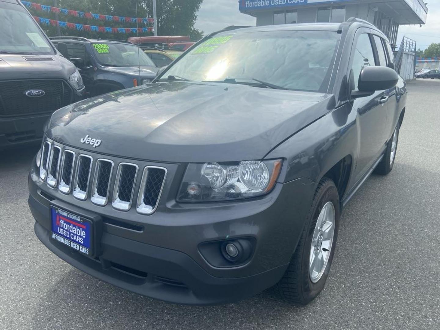 2015 BLACK JEEP COMPASS SPORT (1C4NJCBA6FD) with an 2.0L engine, Continuously Variable transmission, located at 929 East 8th Ave, Anchorage, AK, 99501, (907) 274-2277, 61.214783, -149.866074 - Photo#0