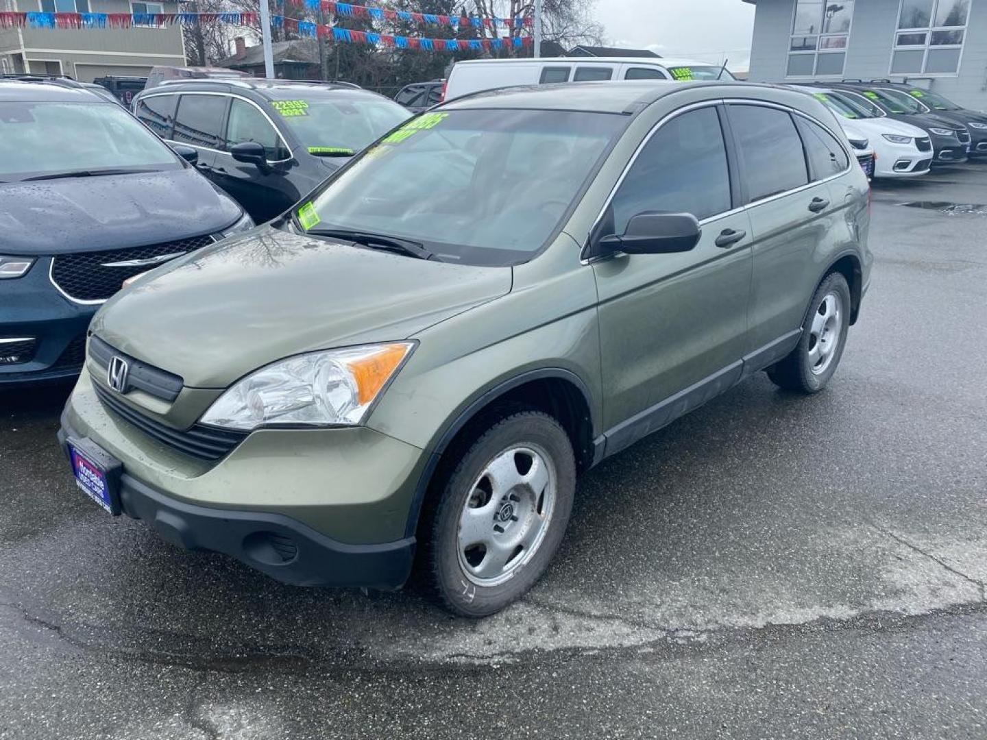 2007 GREEN HONDA CR-V LX (JHLRE48307C) with an 2.4L engine, Automatic transmission, located at 929 East 8th Ave, Anchorage, AK, 99501, (907) 274-2277, 61.214783, -149.866074 - Photo#0