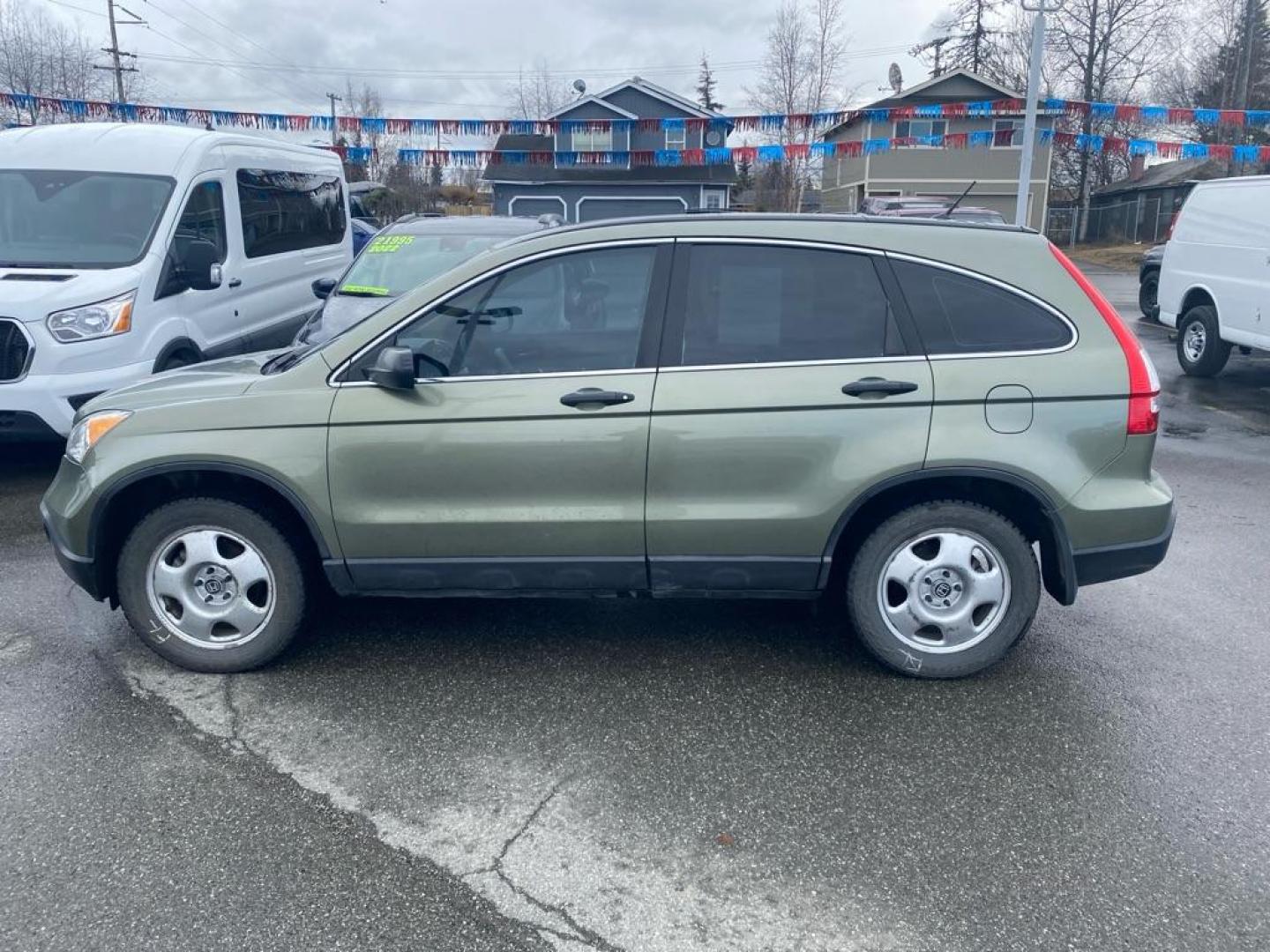 2007 GREEN HONDA CR-V LX (JHLRE48307C) with an 2.4L engine, Automatic transmission, located at 929 East 8th Ave, Anchorage, AK, 99501, (907) 274-2277, 61.214783, -149.866074 - Photo#1