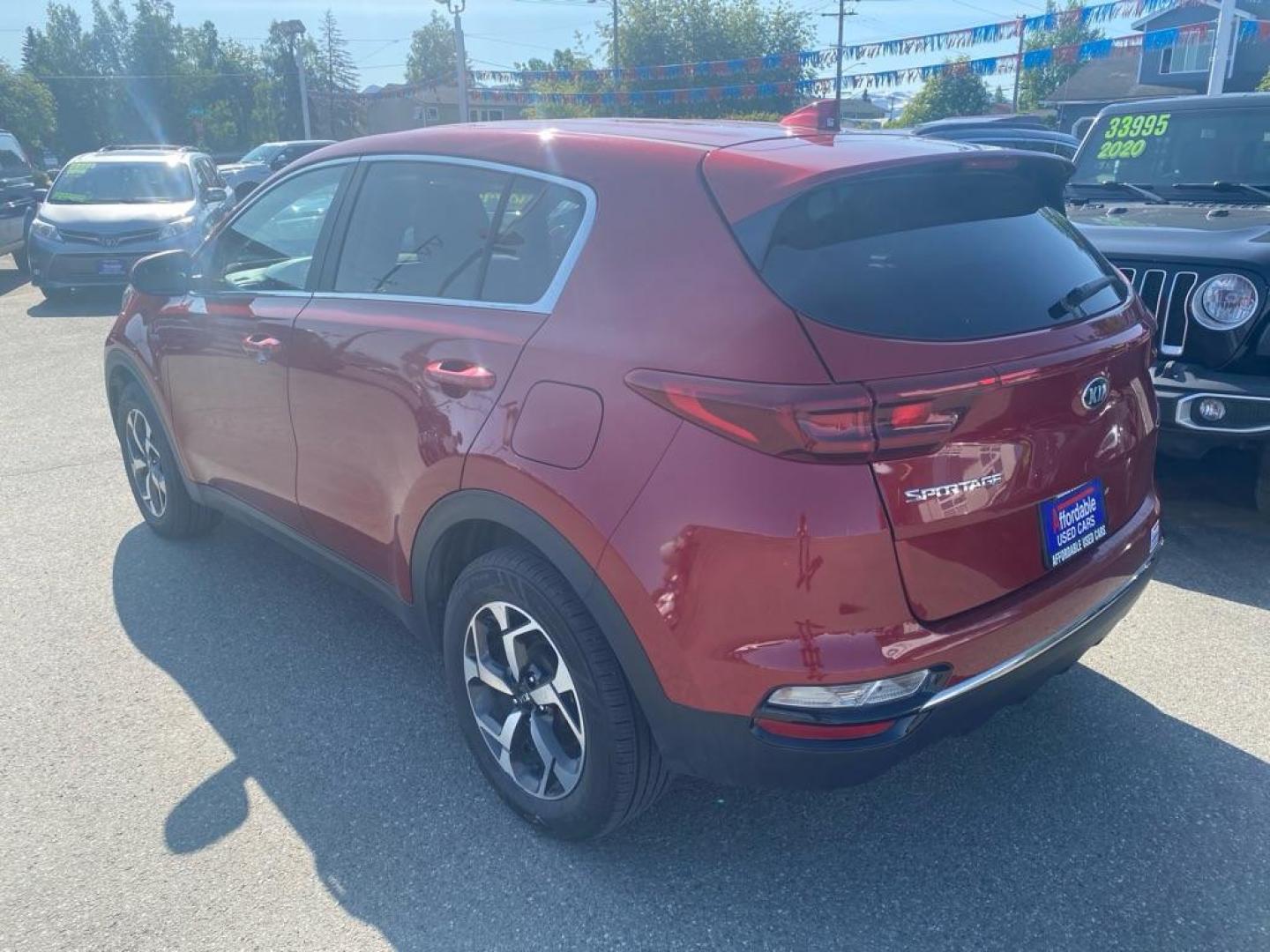 2020 MAROON KIA SPORTAGE LX (KNDPMCAC6L7) with an 2.4L engine, Automatic transmission, located at 929 East 8th Ave, Anchorage, AK, 99501, (907) 274-2277, 61.214783, -149.866074 - Photo#2