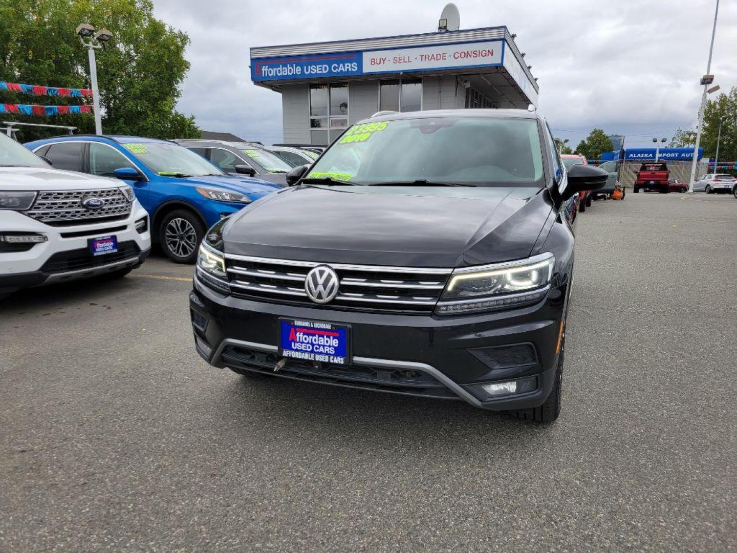 2019 BLACK VOLKSWAGEN TIGUAN SEL PREMIUM (3VV4B7AXXKM) with an 2.0L engine, Automatic transmission, located at 929 East 8th Ave, Anchorage, AK, 99501, (907) 274-2277, 61.214783, -149.866074 - Photo#0