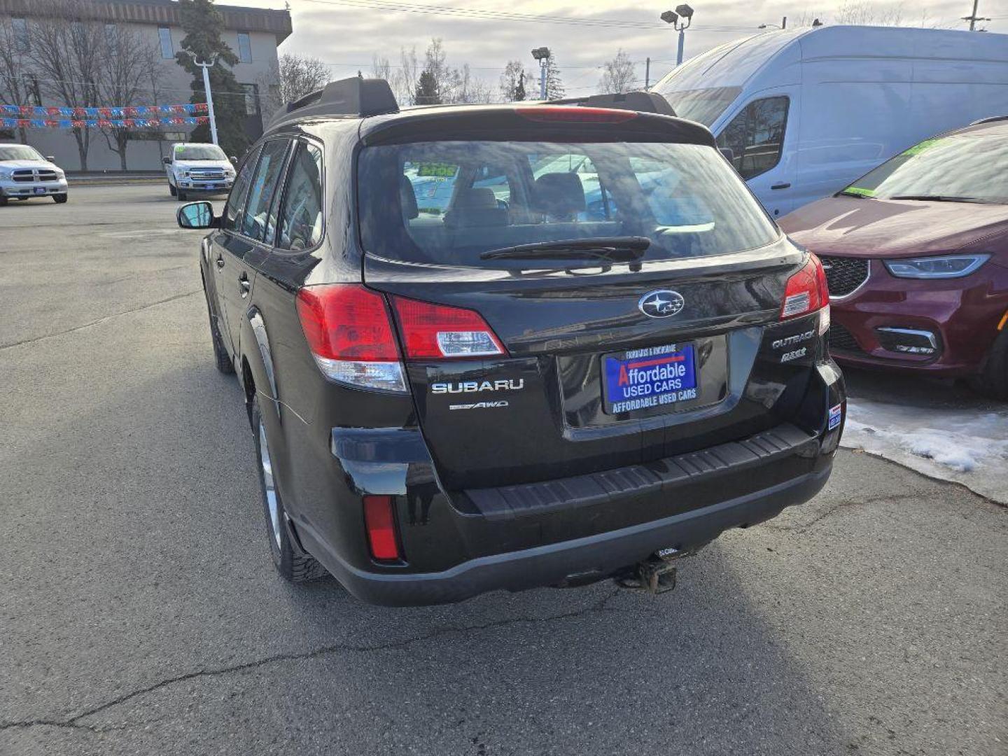 2014 BLACK SUBARU OUTBACK 2.5I (4S4BRBAC1E3) with an 2.5L engine, Continuously Variable transmission, located at 929 East 8th Ave, Anchorage, AK, 99501, (907) 274-2277, 61.214783, -149.866074 - Photo#2