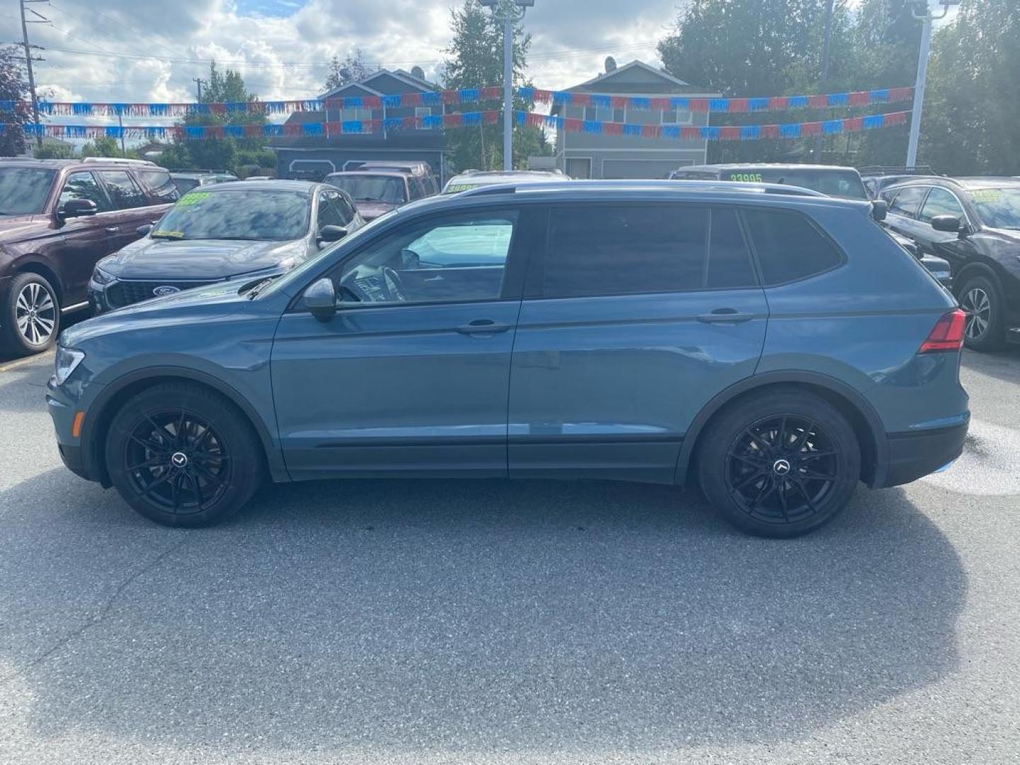 2021 BLUE VOLKSWAGEN TIGUAN SE (3VV2B7AX4MM) with an 2.0L engine, Automatic transmission, located at 929 East 8th Ave, Anchorage, AK, 99501, (907) 274-2277, 61.214783, -149.866074 - Photo#1