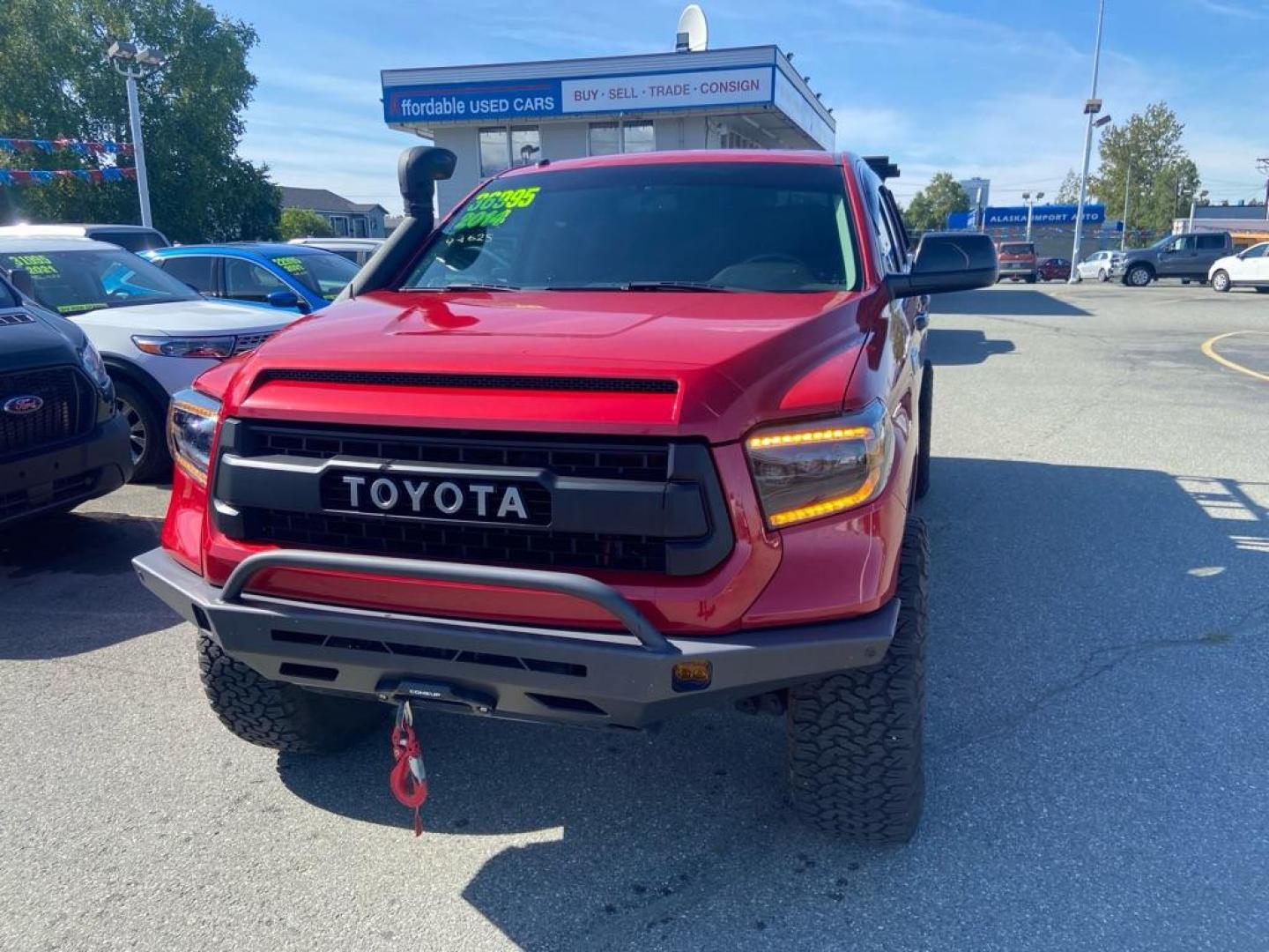 2014 RED TOYOTA TUNDRA CREWMAX PLATINUM (5TFAY5F10EX) with an 5.7L engine, Automatic transmission, located at 929 East 8th Ave, Anchorage, AK, 99501, (907) 274-2277, 61.214783, -149.866074 - Photo#0