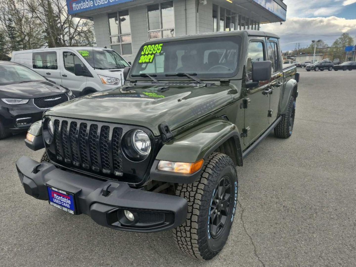2021 GREEN JEEP GLADIATOR SPORT (1C6HJTAG3ML) with an 3.6L engine, Automatic transmission, located at 929 East 8th Ave, Anchorage, AK, 99501, (907) 274-2277, 61.214783, -149.866074 - Photo#0