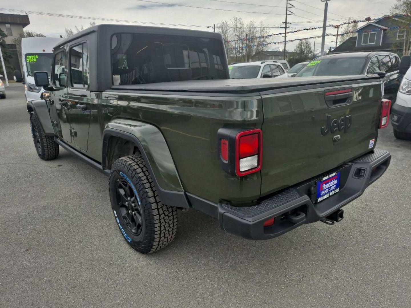 2021 GREEN JEEP GLADIATOR SPORT (1C6HJTAG3ML) with an 3.6L engine, Automatic transmission, located at 929 East 8th Ave, Anchorage, AK, 99501, (907) 274-2277, 61.214783, -149.866074 - Photo#2