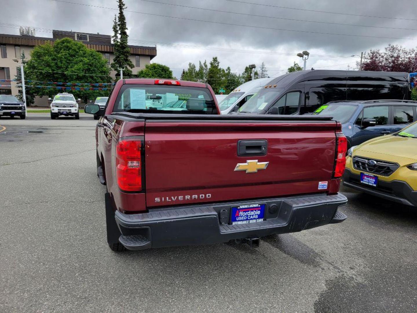 2015 MAROON CHEVROLET SILVERADO 1500 (1GCNKPEH4FZ) with an 4.3L engine, Automatic transmission, located at 929 East 8th Ave, Anchorage, AK, 99501, (907) 274-2277, 61.214783, -149.866074 - Photo#2