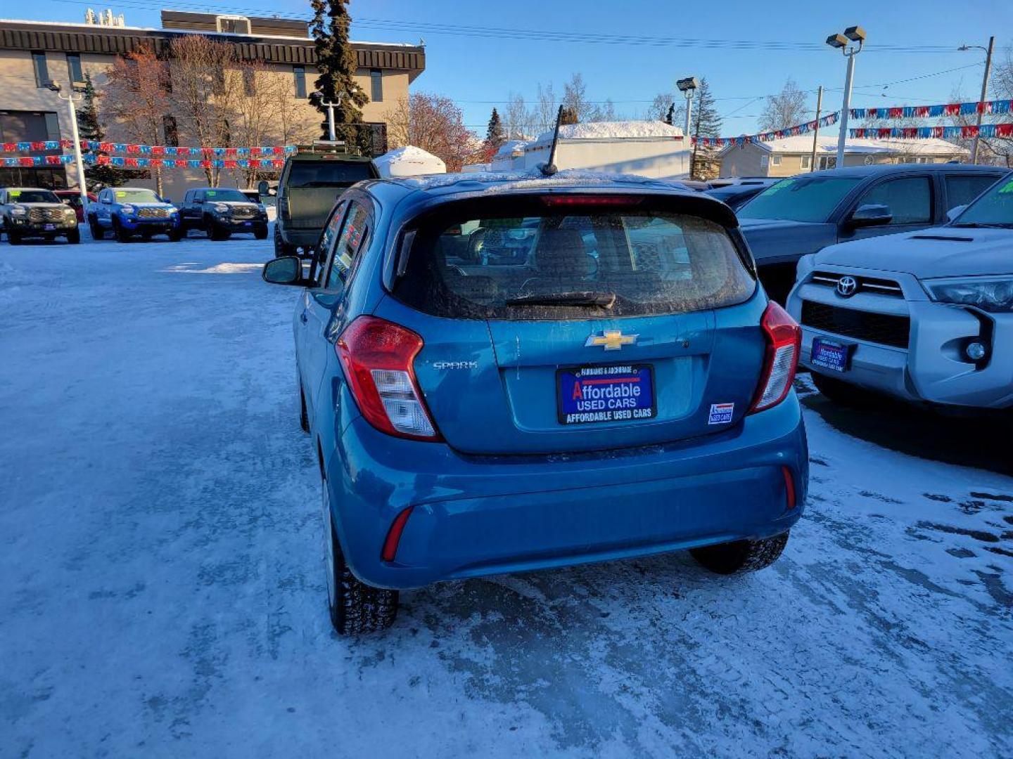 2021 BLUE CHEVROLET SPARK LS (KL8CB6SA0MC) with an 1.4L engine, Continuously Variable transmission, located at 929 East 8th Ave, Anchorage, AK, 99501, (907) 274-2277, 61.214783, -149.866074 - Photo#2