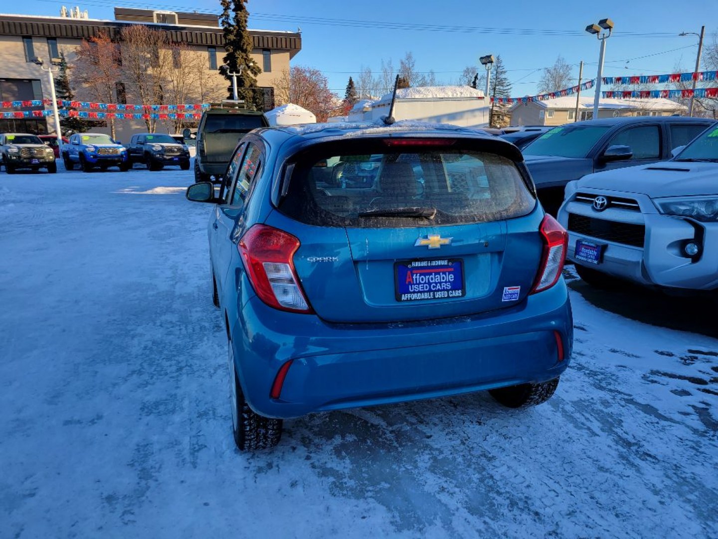2021 BLUE CHEVROLET SPARK LS (KL8CB6SA0MC) with an 1.4L engine, Continuously Variable transmission, located at 929 East 8th Ave, Anchorage, AK, 99501, (907) 274-2277, 61.214783, -149.866074- Photo#2