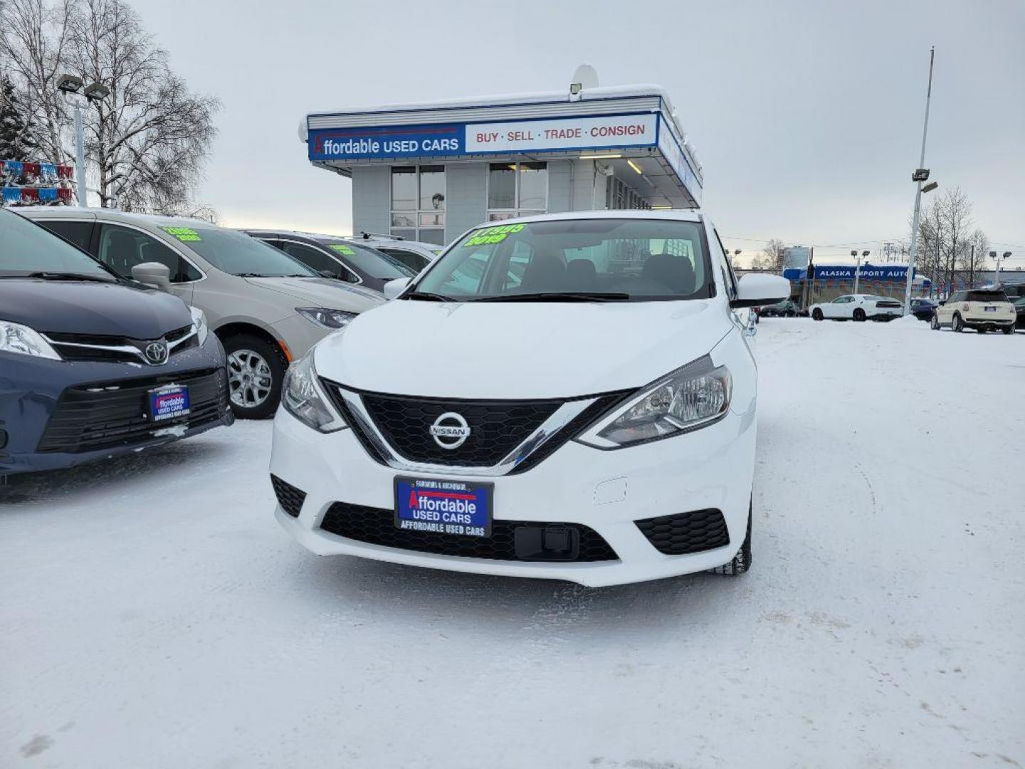 2019 WHITE NISSAN SENTRA S (3N1AB7AP6KY) with an 1.8L engine, Continuously Variable transmission, located at 929 East 8th Ave, Anchorage, AK, 99501, (907) 274-2277, 61.214783, -149.866074 - Photo#0