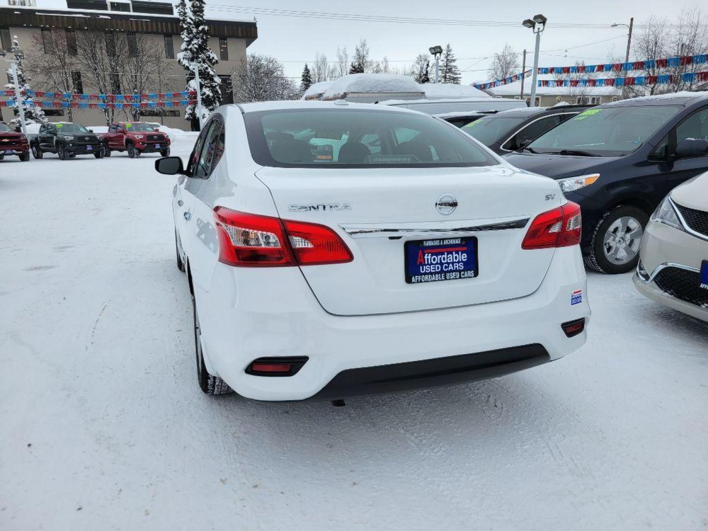 2019 WHITE NISSAN SENTRA S (3N1AB7AP6KY) with an 1.8L engine, Continuously Variable transmission, located at 929 East 8th Ave, Anchorage, AK, 99501, (907) 274-2277, 61.214783, -149.866074 - Photo#2