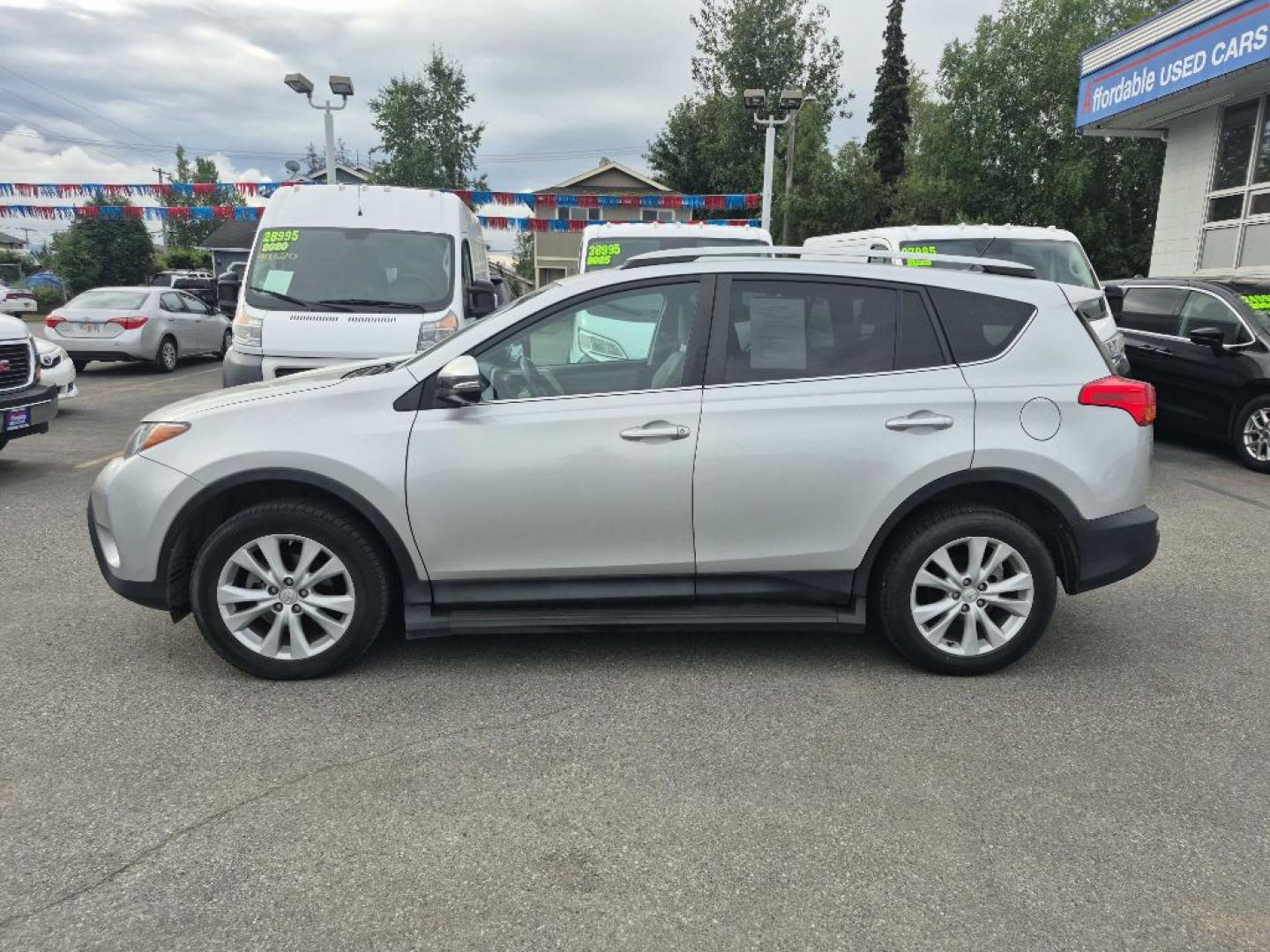 2014 SILVER TOYOTA RAV4 LIMITED (2T3DFREV1EW) with an 2.5L engine, Automatic transmission, located at 929 East 8th Ave, Anchorage, AK, 99501, (907) 274-2277, 61.214783, -149.866074- Photo#1