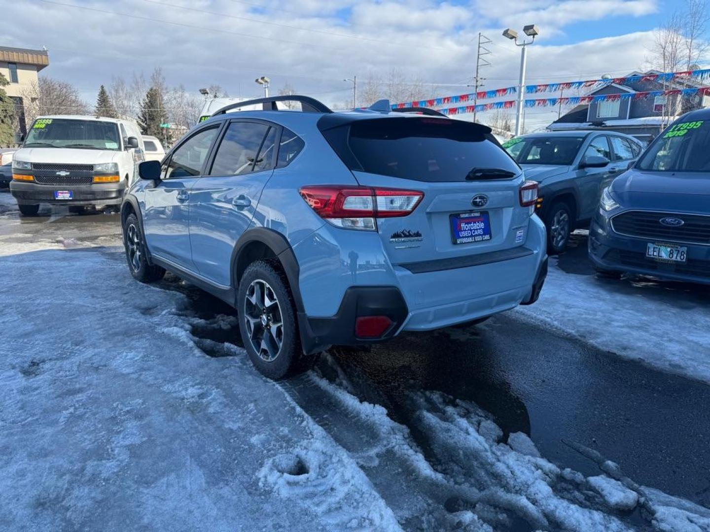 2018 BLUE SUBARU CROSSTREK PREMIUM (JF2GTABC8JH) with an 2.0L engine, 6-Speed Manual transmission, located at 929 East 8th Ave, Anchorage, AK, 99501, (907) 274-2277, 61.214783, -149.866074 - Photo#2