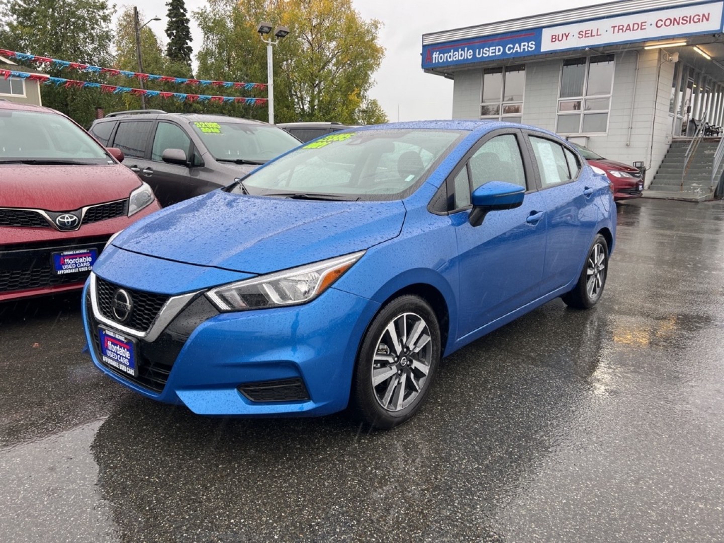2021 BLUE NISSAN VERSA SV (3N1CN8EVXML) with an 1.6L engine, Continuously Variable transmission, located at 929 East 8th Ave, Anchorage, AK, 99501, (907) 274-2277, 61.214783, -149.866074- Photo#0