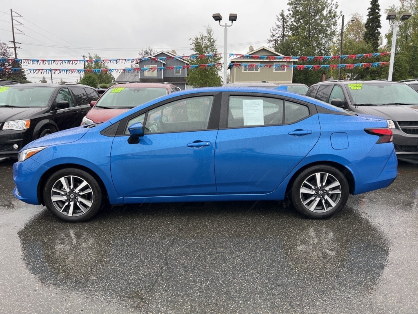 2021 BLUE NISSAN VERSA SV (3N1CN8EVXML) with an 1.6L engine, Continuously Variable transmission, located at 929 East 8th Ave, Anchorage, AK, 99501, (907) 274-2277, 61.214783, -149.866074- Photo#1