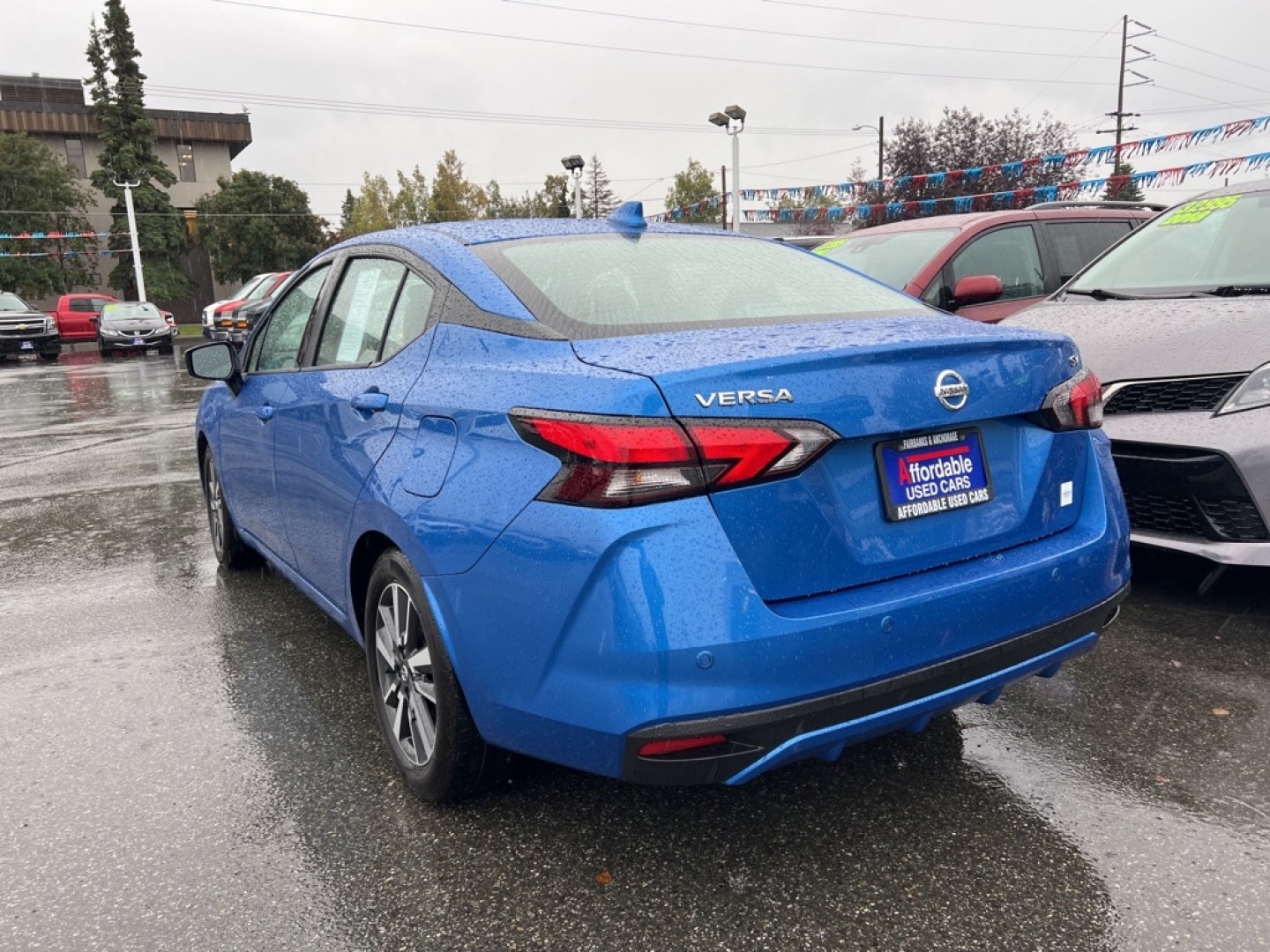 2021 BLUE NISSAN VERSA SV (3N1CN8EVXML) with an 1.6L engine, Continuously Variable transmission, located at 929 East 8th Ave, Anchorage, AK, 99501, (907) 274-2277, 61.214783, -149.866074- Photo#2