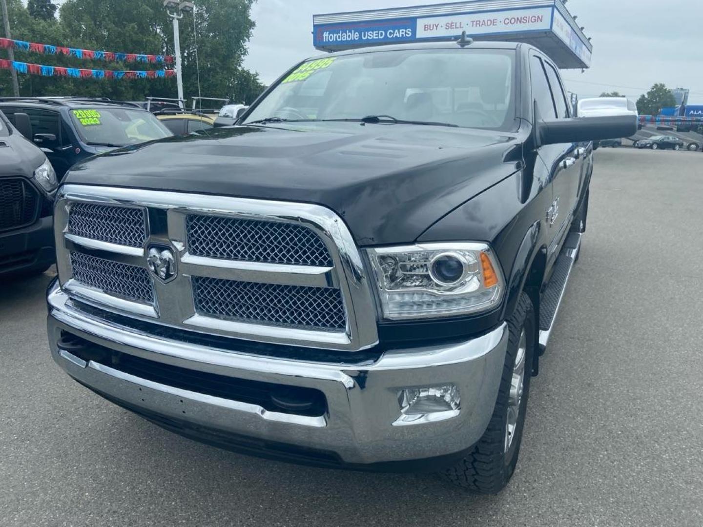 2015 BLACK RAM 2500 LONGHORN (3C6UR5PJ8FG) with an 6.4L engine, Automatic transmission, located at 929 East 8th Ave, Anchorage, AK, 99501, (907) 274-2277, 61.214783, -149.866074 - Photo#0