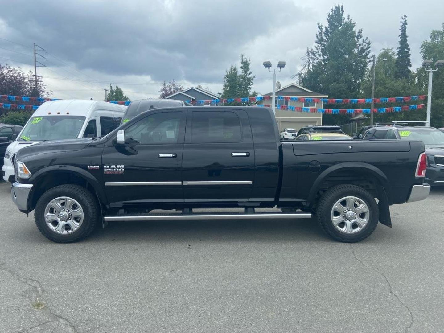 2015 BLACK RAM 2500 LONGHORN (3C6UR5PJ8FG) with an 6.4L engine, Automatic transmission, located at 929 East 8th Ave, Anchorage, AK, 99501, (907) 274-2277, 61.214783, -149.866074 - Photo#1