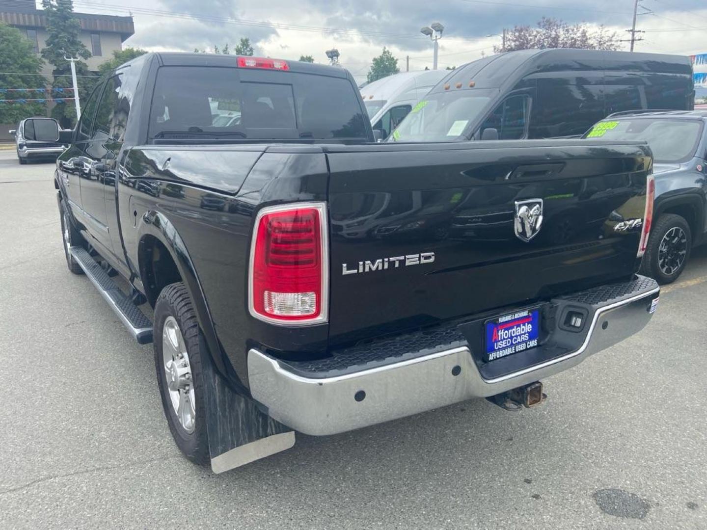 2015 BLACK RAM 2500 LONGHORN (3C6UR5PJ8FG) with an 6.4L engine, Automatic transmission, located at 929 East 8th Ave, Anchorage, AK, 99501, (907) 274-2277, 61.214783, -149.866074 - Photo#2