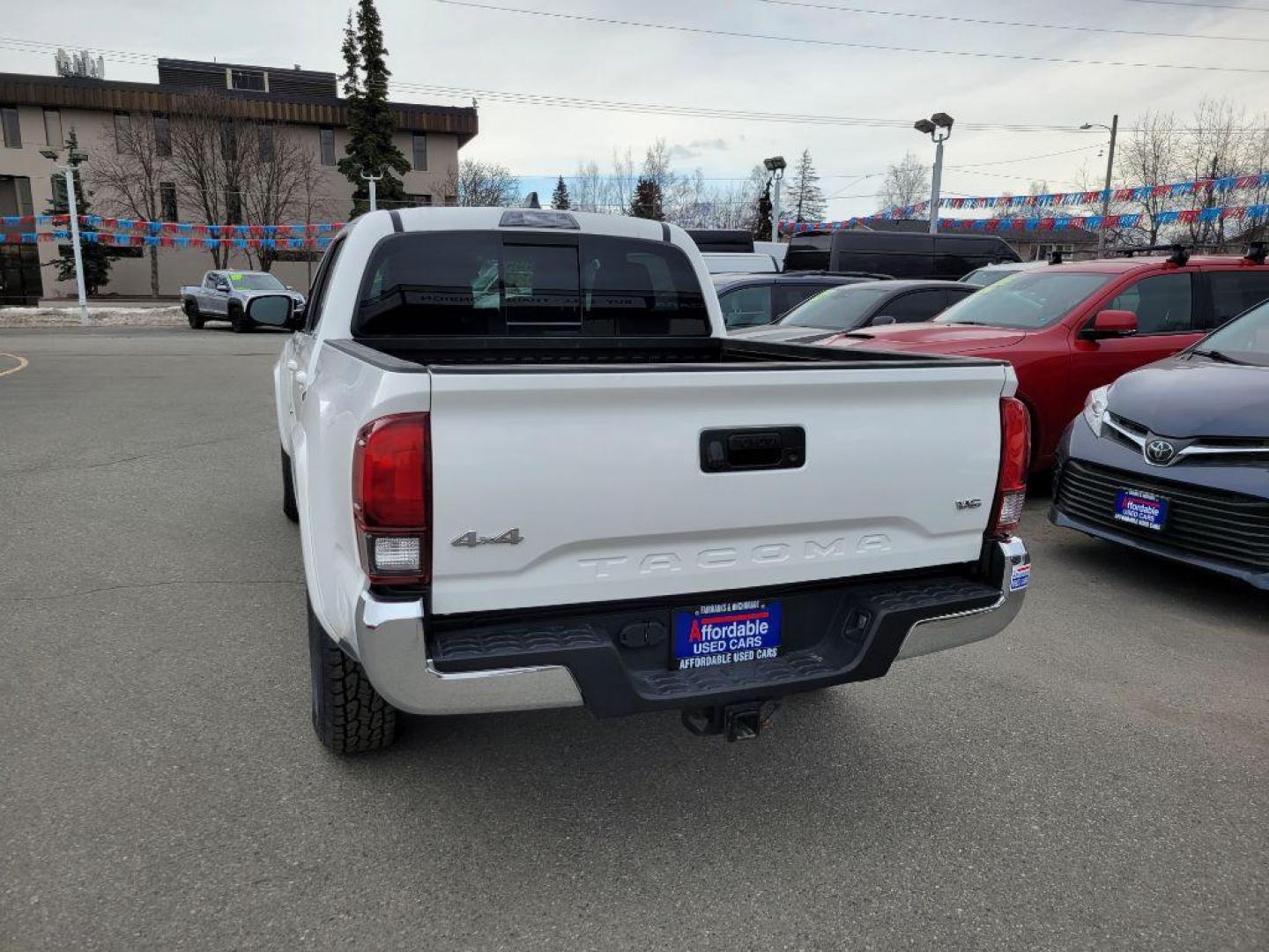 2021 WHITE TOYOTA TACOMA DOUBLE CAB (3TMCZ5ANXMM) with an 3.5L engine, Automatic transmission, located at 929 East 8th Ave, Anchorage, AK, 99501, (907) 274-2277, 61.214783, -149.866074 - Photo#2