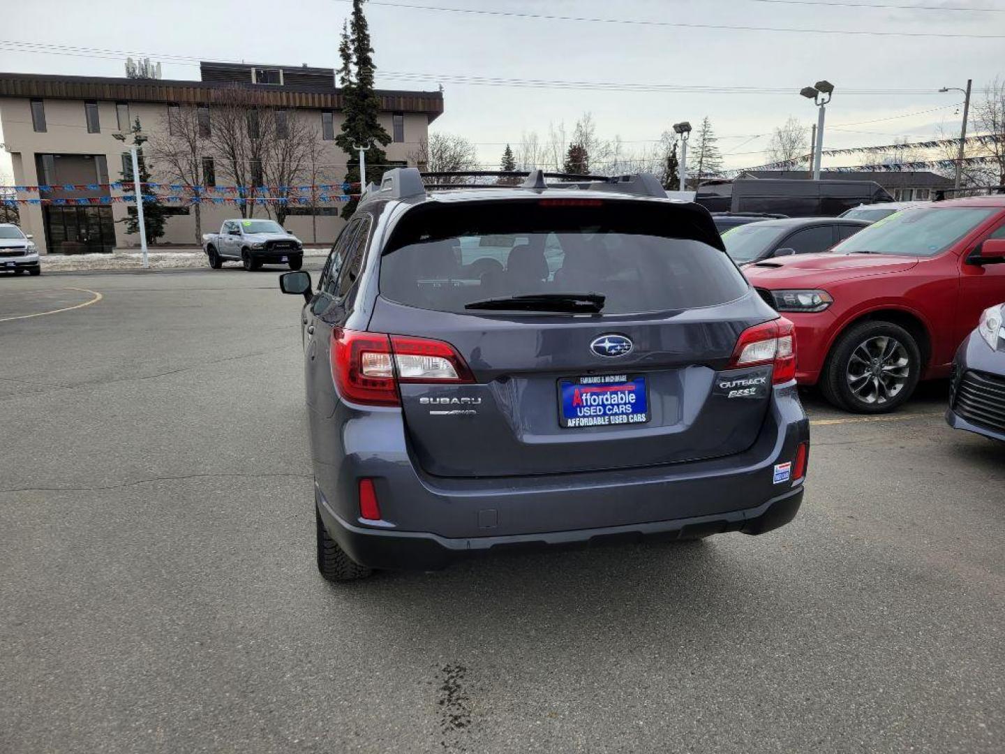 2017 BLUE SUBARU OUTBACK 2.5I PREMIUM (4S4BSACC7H3) with an 2.5L engine, Continuously Variable transmission, located at 929 East 8th Ave, Anchorage, AK, 99501, (907) 274-2277, 61.214783, -149.866074 - Photo#2