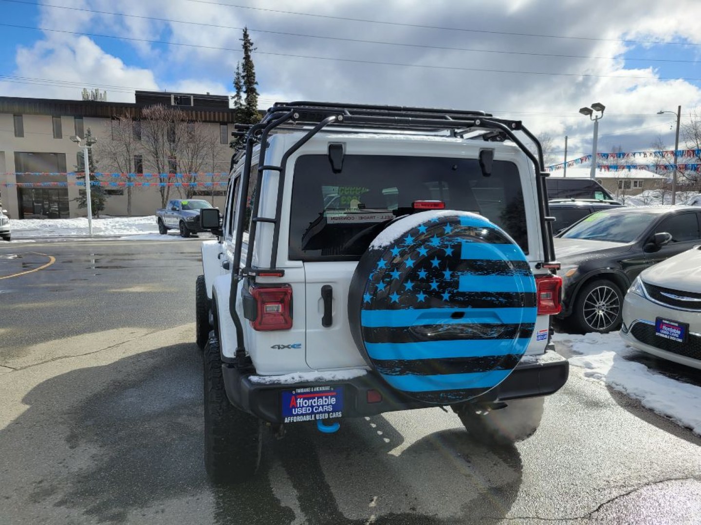 2023 WHITE JEEP WRANGLER RUBICON 4XE (1C4JJXR6XPW) with an 2.0L engine, Automatic transmission, located at 929 East 8th Ave, Anchorage, AK, 99501, (907) 274-2277, 61.214783, -149.866074- Photo#2