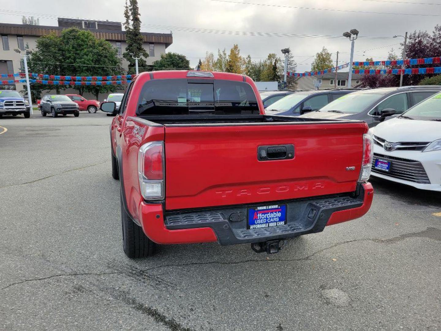 2021 RED TOYOTA TACOMA TRD DOUBLE CAB (3TMCZ5AN7MM) with an 3.5L engine, Automatic transmission, located at 929 East 8th Ave, Anchorage, AK, 99501, (907) 274-2277, 61.214783, -149.866074 - Photo#2