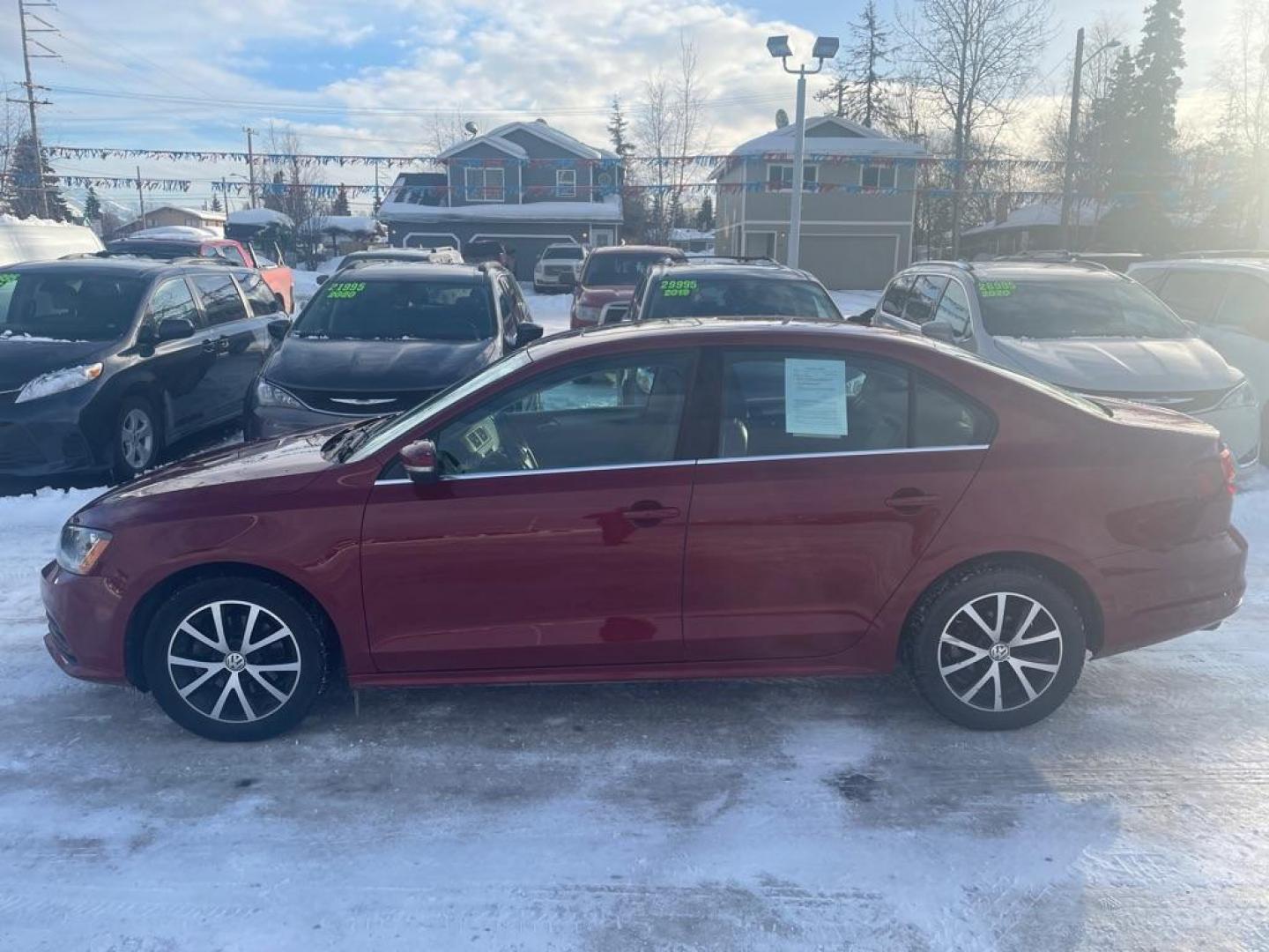 2017 RED VOLKSWAGEN JETTA SE (3VWB67AJ2HM) with an 1.4L engine, 5-Speed Manual transmission, located at 929 East 8th Ave, Anchorage, AK, 99501, (907) 274-2277, 61.214783, -149.866074 - Photo#1