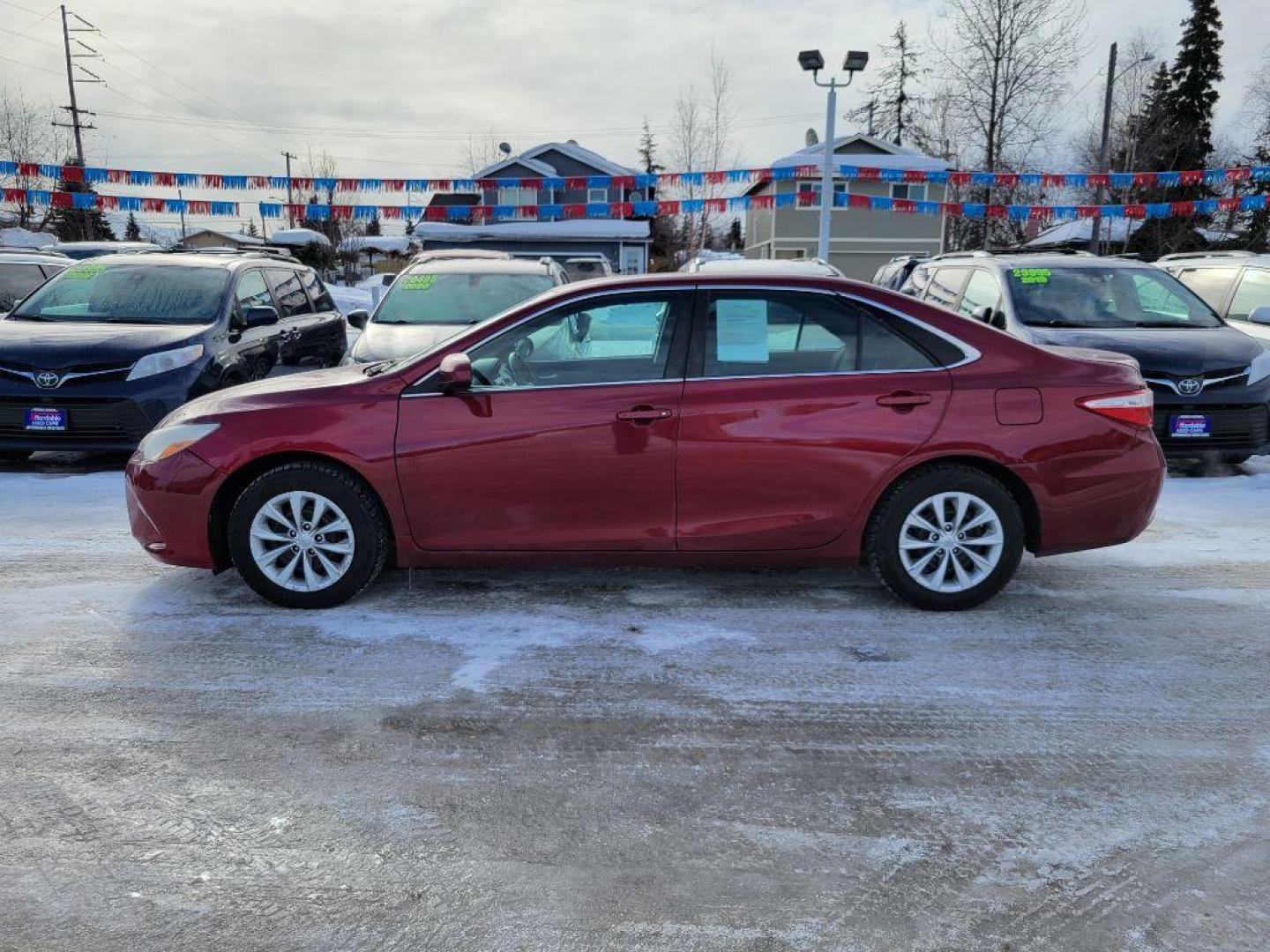 2016 RED TOYOTA CAMRY HYBRID (4T1BD1FK0GU) with an 2.5L engine, Continuously Variable transmission, located at 929 East 8th Ave, Anchorage, AK, 99501, (907) 274-2277, 61.214783, -149.866074 - Photo#1