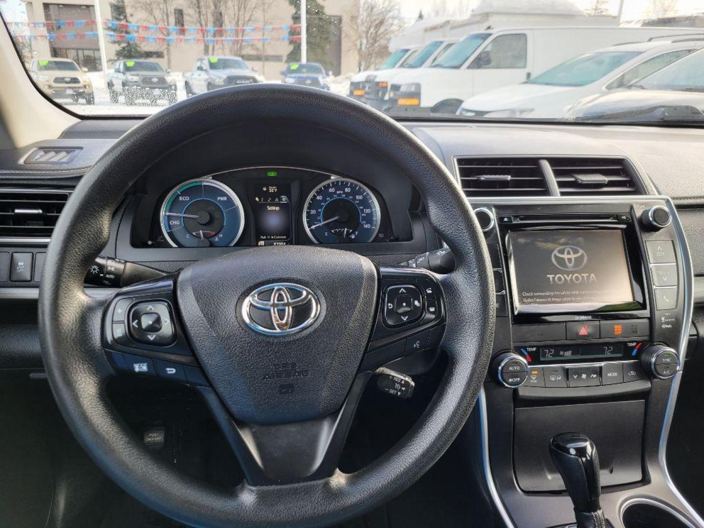 2016 RED TOYOTA CAMRY HYBRID (4T1BD1FK0GU) with an 2.5L engine, Continuously Variable transmission, located at 929 East 8th Ave, Anchorage, AK, 99501, (907) 274-2277, 61.214783, -149.866074 - Photo#4