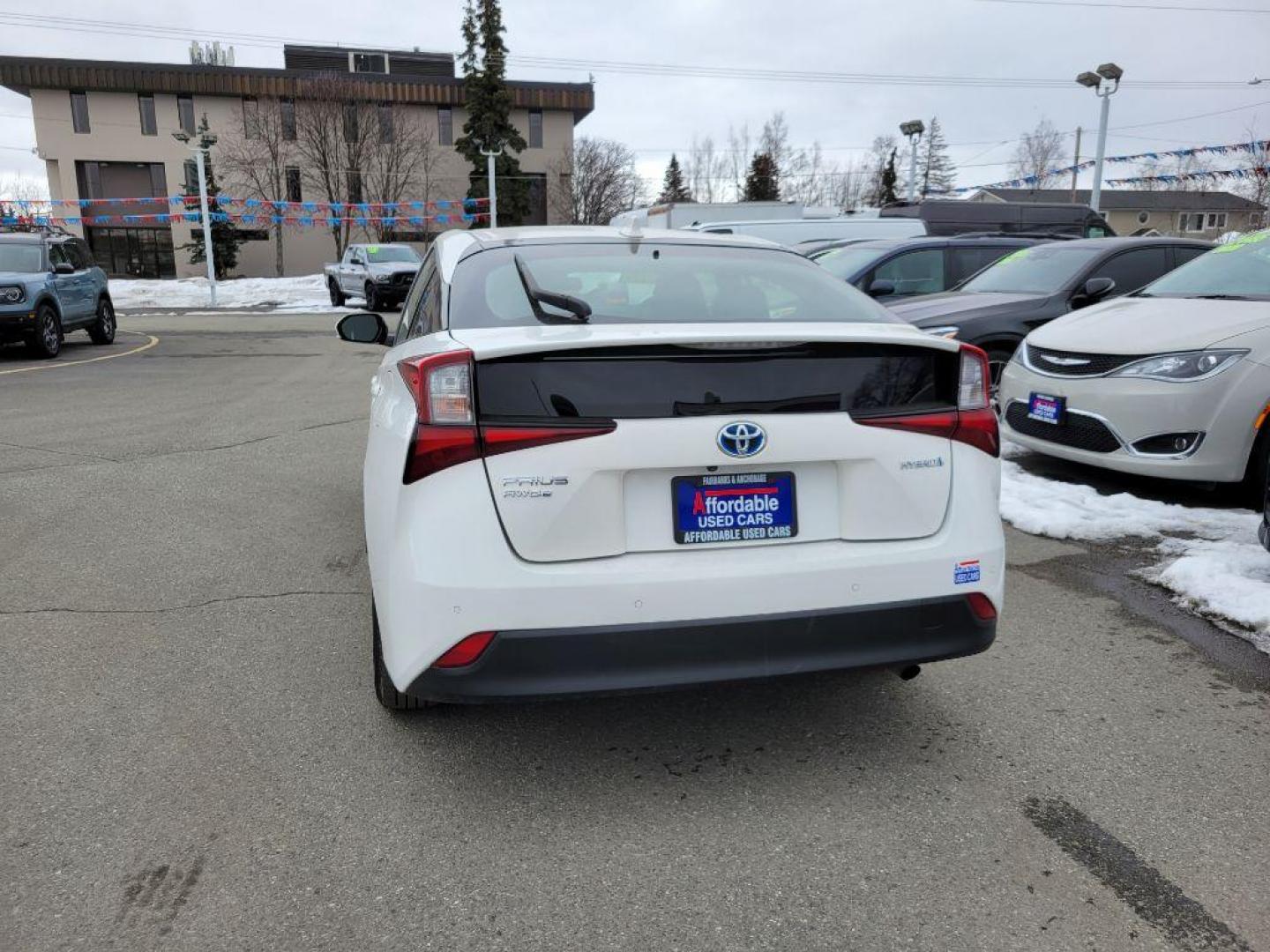 2020 WHITE TOYOTA PRIUS LE (JTDL9RFU3L3) with an 1.8L engine, Continuously Variable transmission, located at 929 East 8th Ave, Anchorage, AK, 99501, (907) 274-2277, 61.214783, -149.866074 - Photo#2