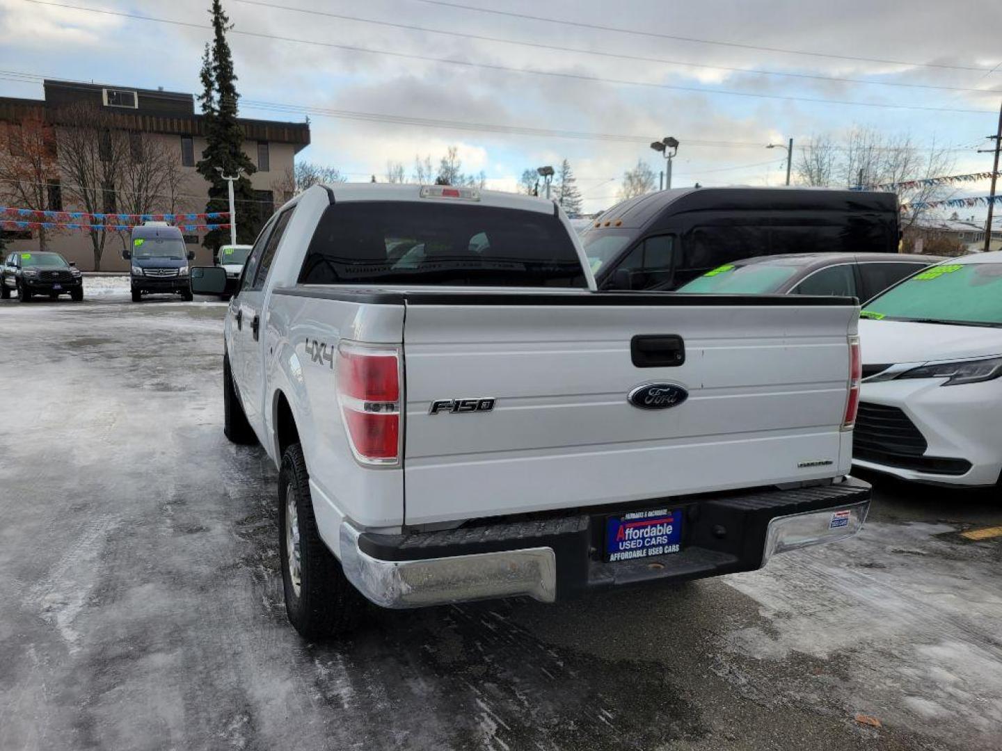 2013 WHITE FORD F150 SUPERCREW (1FTFW1EF4DF) with an 5.0L engine, Automatic transmission, located at 929 East 8th Ave, Anchorage, AK, 99501, (907) 274-2277, 61.214783, -149.866074 - Photo#2