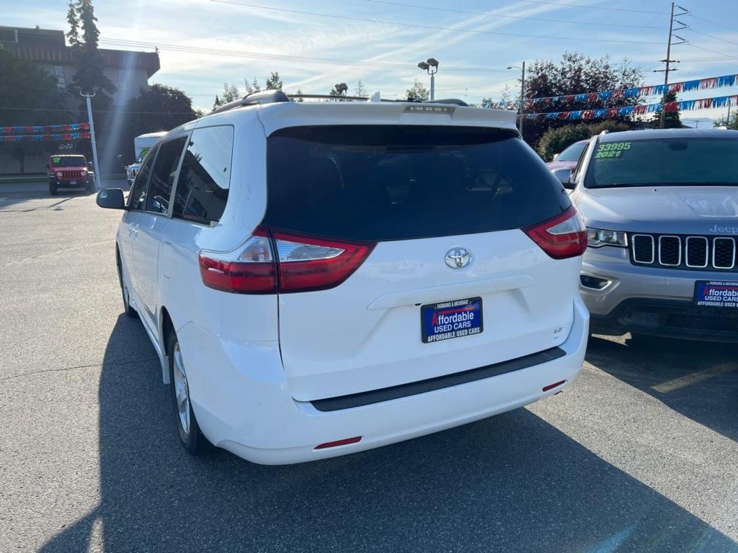 2019 WHITE TOYOTA SIENNA LE (5TDKZ3DC1KS) with an 3.5L engine, Automatic transmission, located at 929 East 8th Ave, Anchorage, AK, 99501, (907) 274-2277, 61.214783, -149.866074 - Photo#2