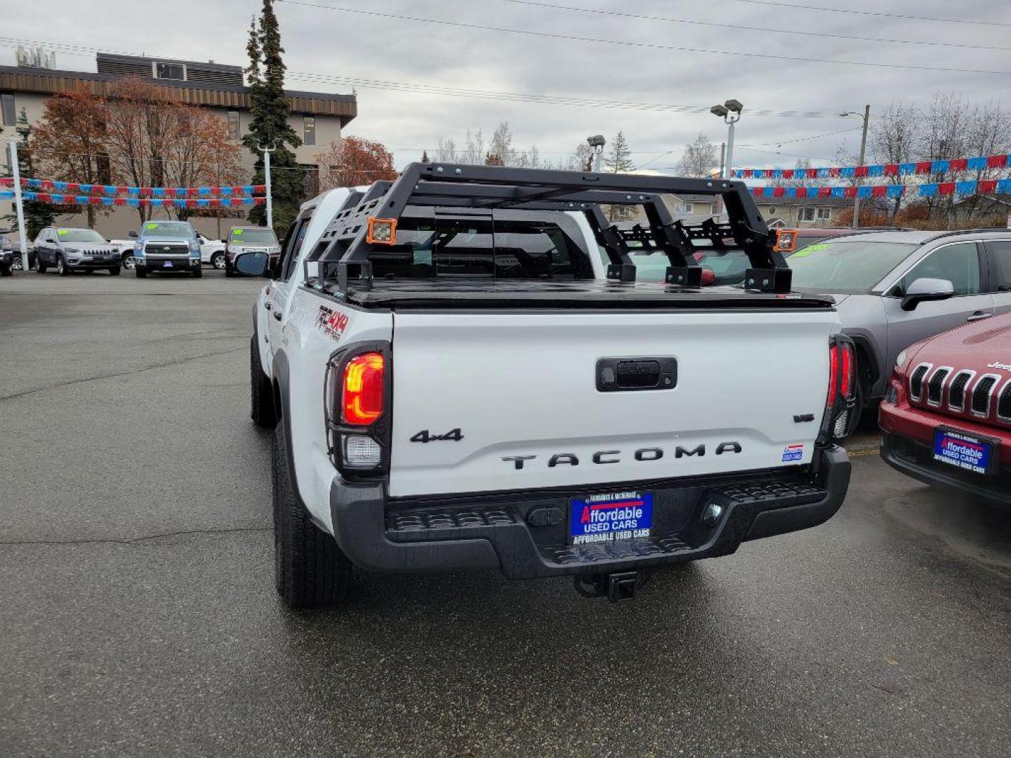 2023 WHITE TOYOTA TACOMA TRD DOUBLE CAB (3TMCZ5AN0PM) with an 3.5L engine, Automatic transmission, located at 929 East 8th Ave, Anchorage, AK, 99501, (907) 274-2277, 61.214783, -149.866074 - Photo#2