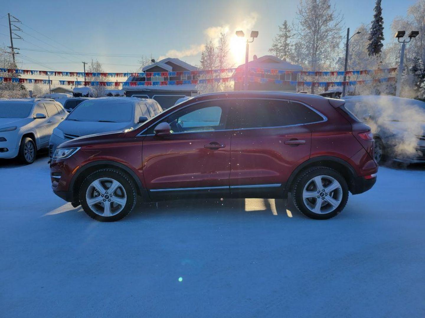 2015 RED LINCOLN MKC (5LMCJ2A95FU) with an 2.0L engine, Automatic transmission, located at 929 East 8th Ave, Anchorage, AK, 99501, (907) 274-2277, 61.214783, -149.866074 - Photo#1