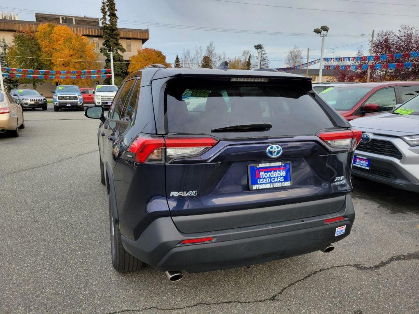 2022 BLUE TOYOTA RAV4 XLE HYBRID XLE (4T3RWRFV3NU) with an 2.5L engine, Automatic transmission, located at 929 East 8th Ave, Anchorage, AK, 99501, (907) 274-2277, 61.214783, -149.866074 - Photo#2