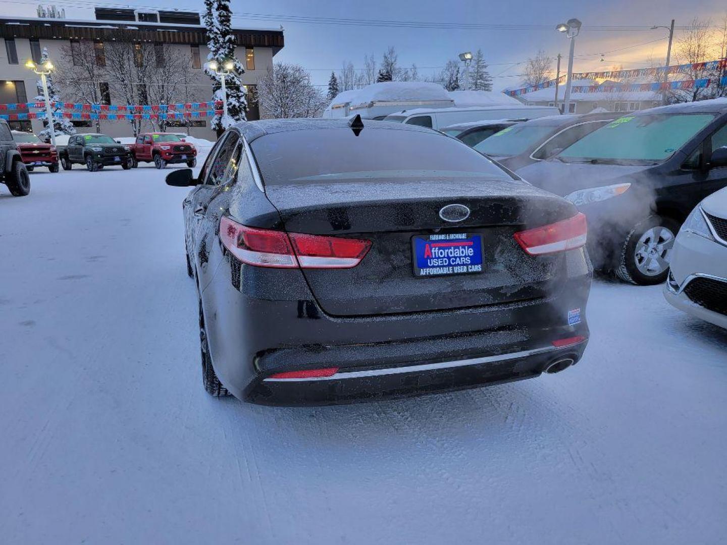 2016 BLACK KIA OPTIMA LX (5XXGT4L32GG) with an 2.4L engine, Automatic transmission, located at 929 East 8th Ave, Anchorage, AK, 99501, (907) 274-2277, 61.214783, -149.866074 - Photo#2