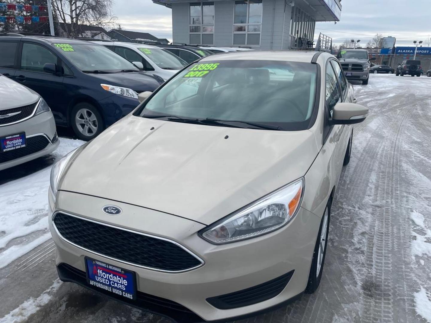 2017 TAN FORD FOCUS SE (1FADP3F25HL) with an 2.0L engine, Automatic transmission, located at 929 East 8th Ave, Anchorage, AK, 99501, (907) 274-2277, 61.214783, -149.866074 - Photo#0