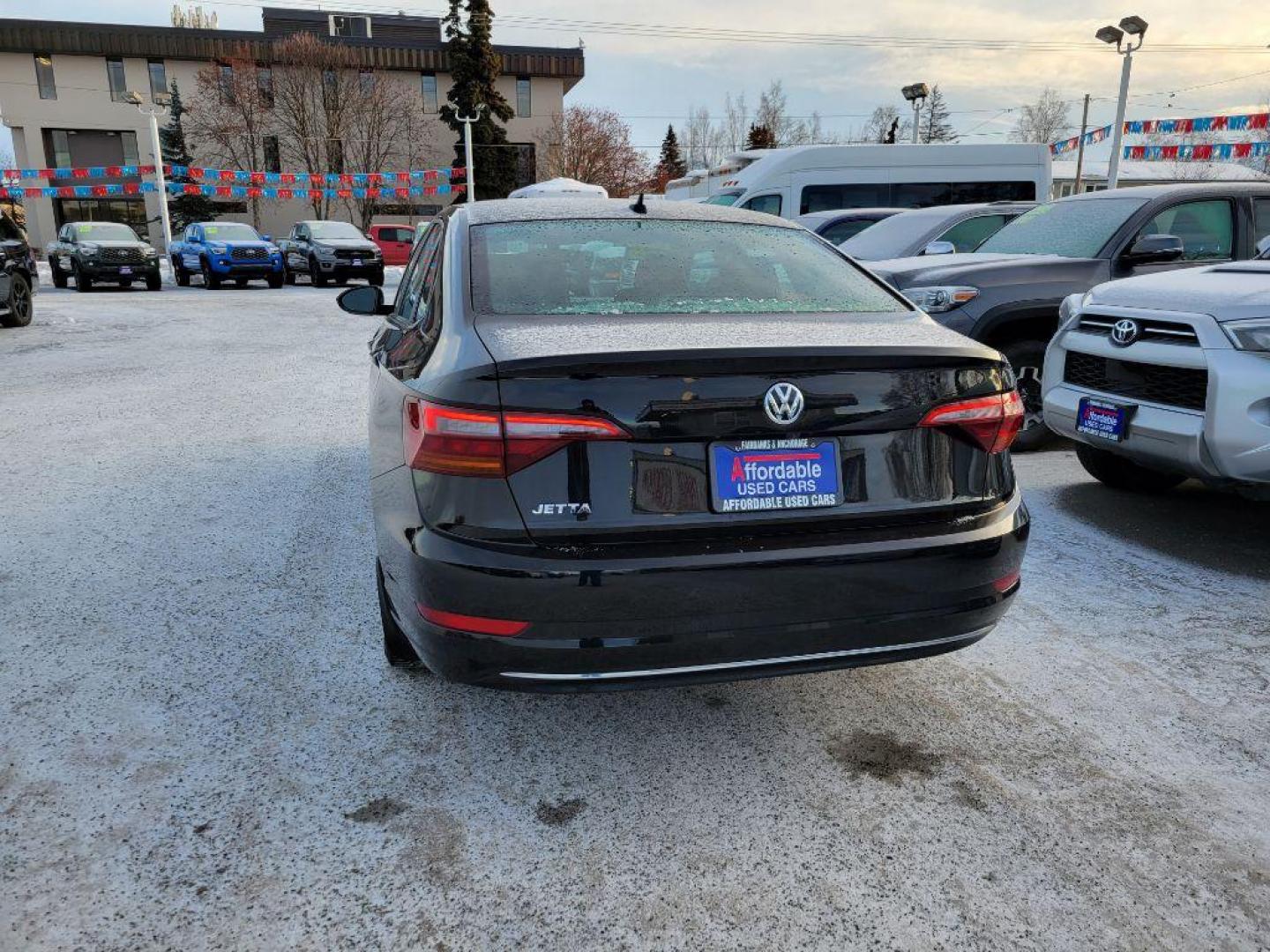 2019 BLACK VOLKSWAGEN JETTA SE (3VWC57BU7KM) with an 1.4L engine, Automatic transmission, located at 929 East 8th Ave, Anchorage, AK, 99501, (907) 274-2277, 61.214783, -149.866074 - Photo#2