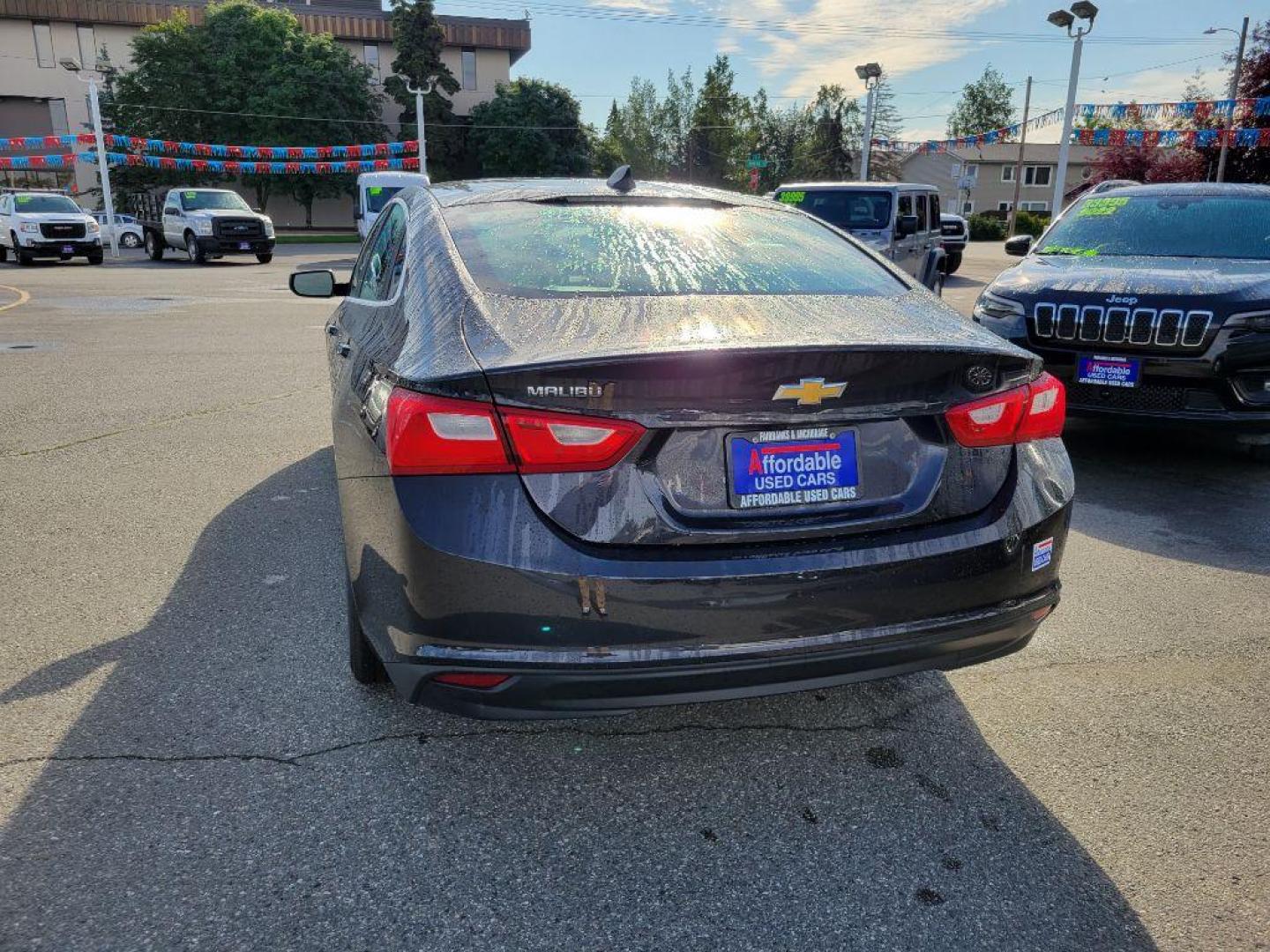 2022 BLACK CHEVROLET MALIBU LS (1G1ZB5ST0NF) with an 1.5L engine, Automatic transmission, located at 929 East 8th Ave, Anchorage, AK, 99501, (907) 274-2277, 61.214783, -149.866074 - Photo#2