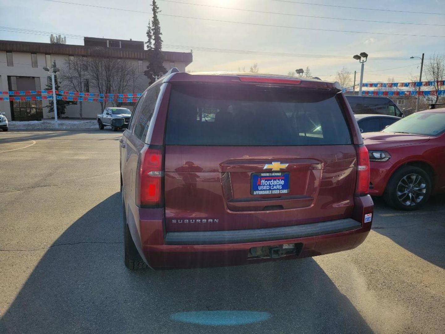 2016 MAROON CHEVROLET SUBURBAN 1500 LS (1GNSKGKC6GR) with an 5.3L engine, Automatic transmission, located at 929 East 8th Ave, Anchorage, AK, 99501, (907) 274-2277, 61.214783, -149.866074 - Photo#2