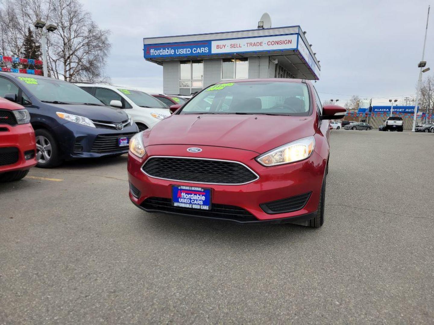 2015 RED FORD FOCUS SE (1FADP3K20FL) with an 2.0L engine, Automatic transmission, located at 929 East 8th Ave, Anchorage, AK, 99501, (907) 274-2277, 61.214783, -149.866074 - Photo#0