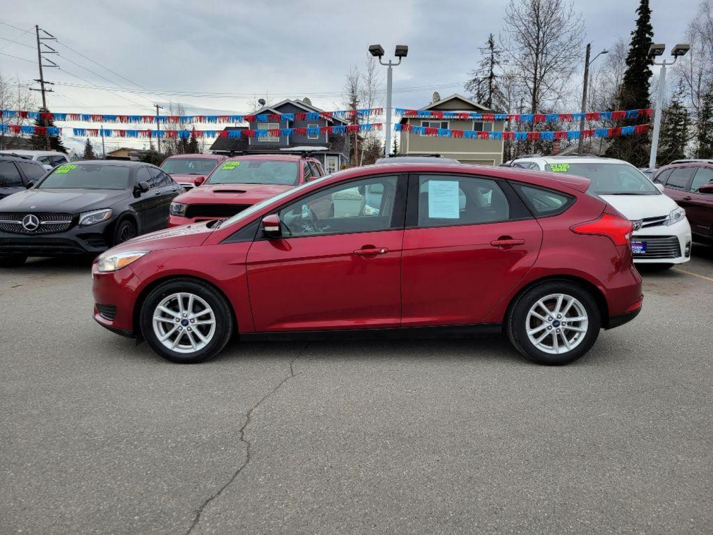 2015 RED FORD FOCUS SE (1FADP3K20FL) with an 2.0L engine, Automatic transmission, located at 929 East 8th Ave, Anchorage, AK, 99501, (907) 274-2277, 61.214783, -149.866074 - Photo#1