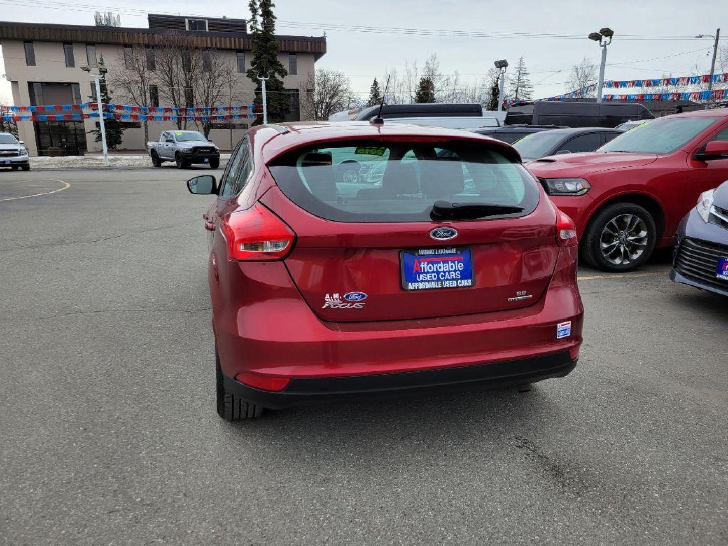 2015 RED FORD FOCUS SE (1FADP3K20FL) with an 2.0L engine, Automatic transmission, located at 929 East 8th Ave, Anchorage, AK, 99501, (907) 274-2277, 61.214783, -149.866074 - Photo#2