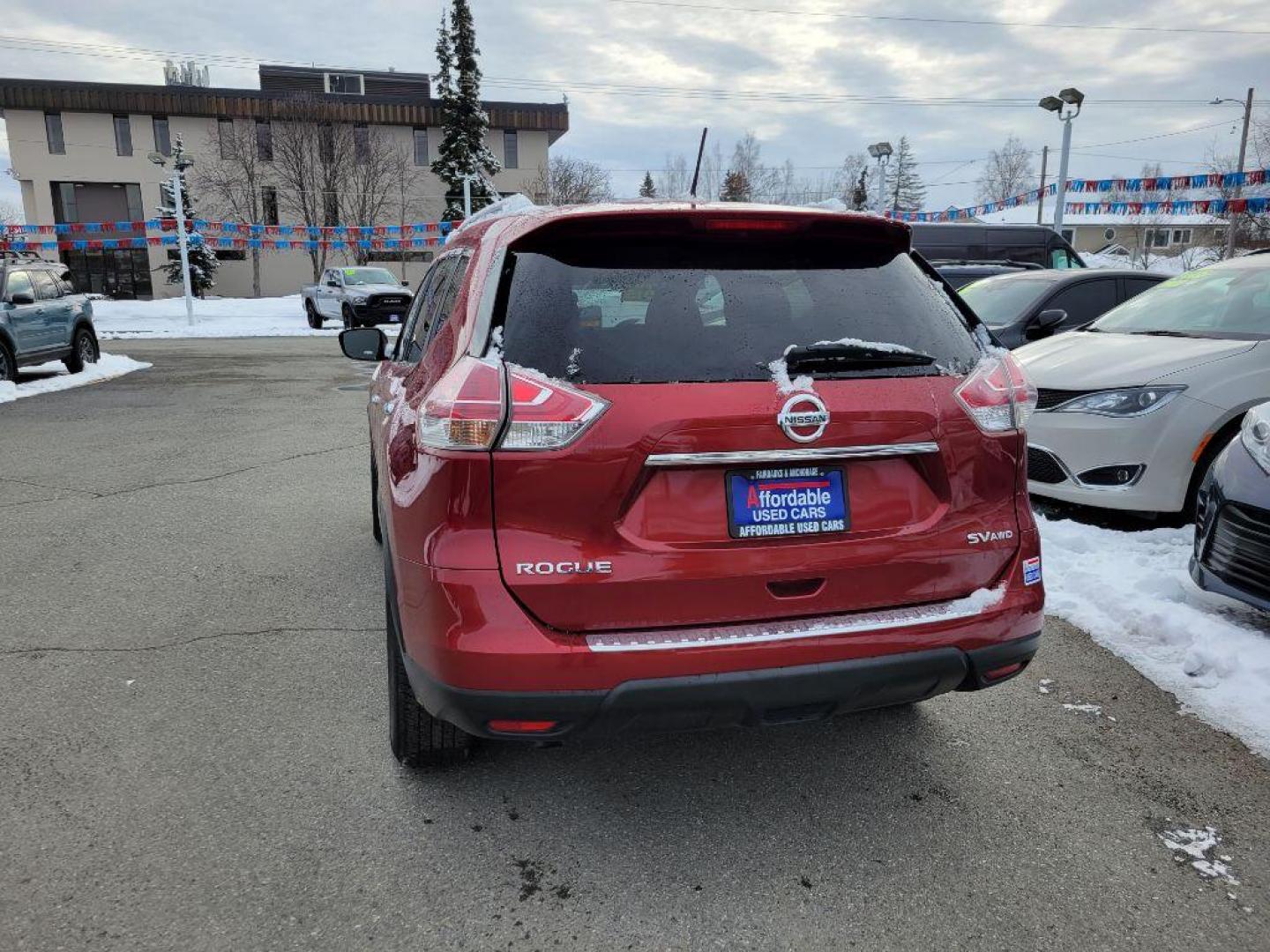 2015 RED NISSAN ROGUE S (KNMAT2MVXFP) with an 2.5L engine, Continuously Variable transmission, located at 929 East 8th Ave, Anchorage, AK, 99501, (907) 274-2277, 61.214783, -149.866074 - Photo#2