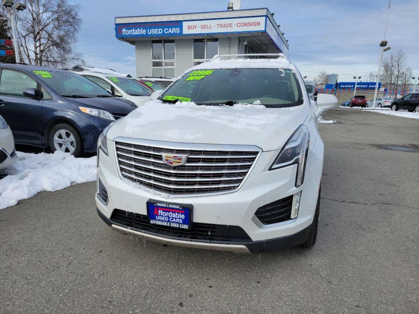 2017 WHITE CADILLAC XT5 PLATINUM (1GYKNFRS5HZ) with an 3.6L engine, Automatic transmission, located at 929 East 8th Ave, Anchorage, AK, 99501, (907) 274-2277, 61.214783, -149.866074 - Photo#0