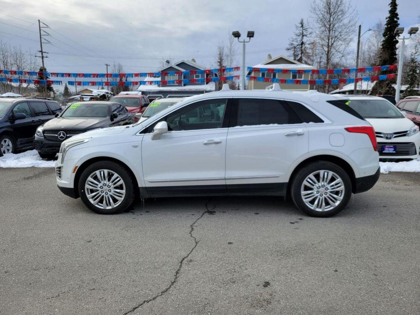 2017 WHITE CADILLAC XT5 PLATINUM (1GYKNFRS5HZ) with an 3.6L engine, Automatic transmission, located at 929 East 8th Ave, Anchorage, AK, 99501, (907) 274-2277, 61.214783, -149.866074 - Photo#1