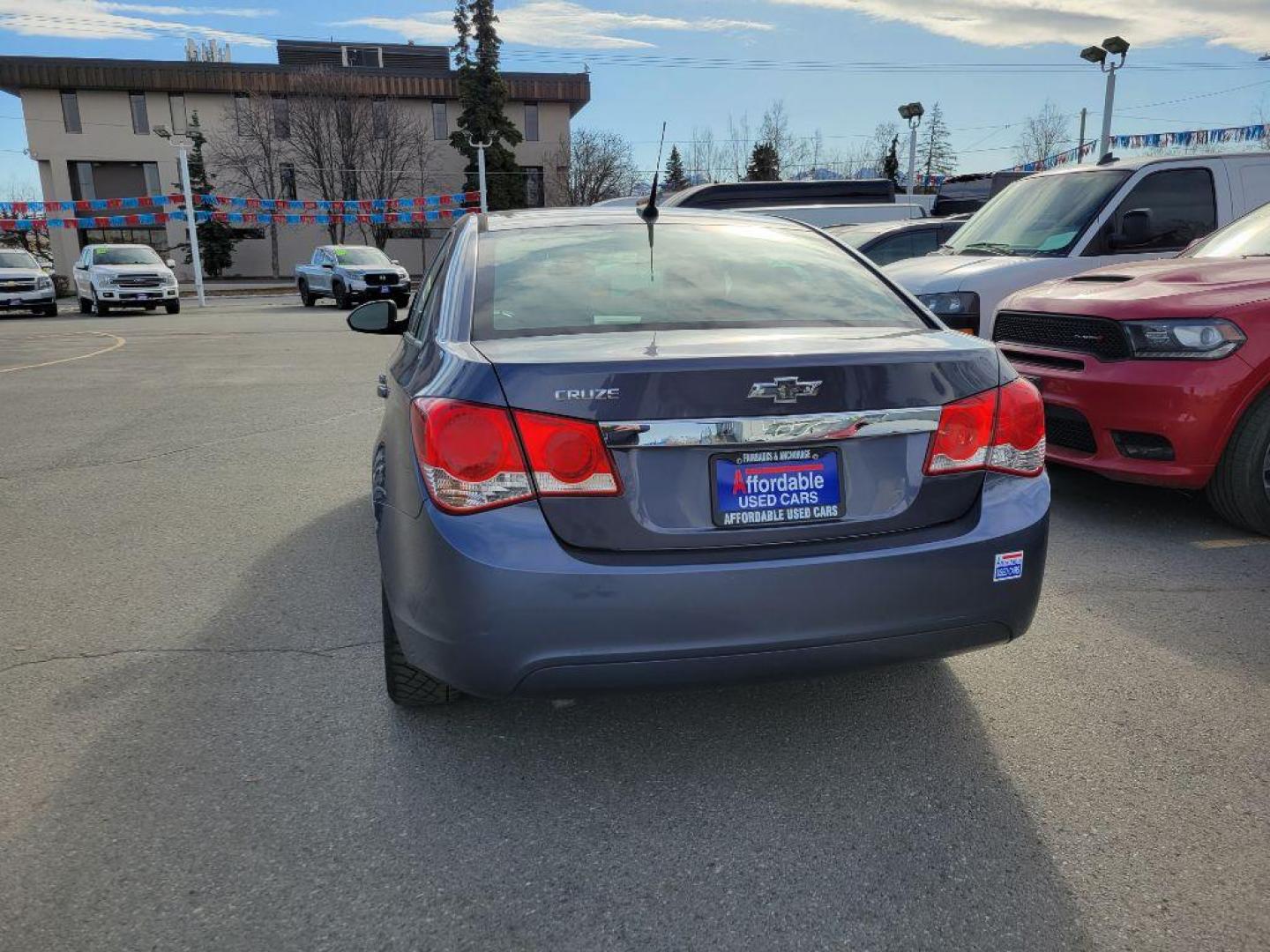 2014 BLUE CHEVROLET CRUZE LS (1G1PB5SH2E7) with an 1.8L engine, 6-Speed Manual transmission, located at 929 East 8th Ave, Anchorage, AK, 99501, (907) 274-2277, 61.214783, -149.866074 - Photo#2