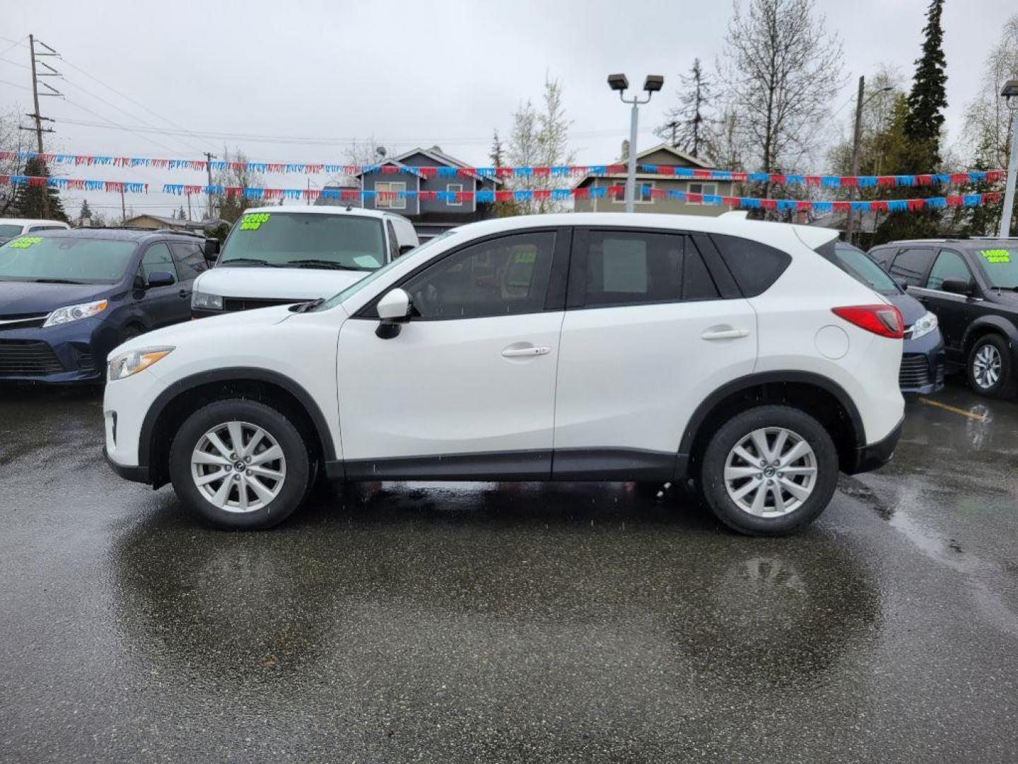 2015 WHITE MAZDA CX-5 TOURING (JM3KE4CY5F0) with an 2.5L engine, Automatic transmission, located at 929 East 8th Ave, Anchorage, AK, 99501, (907) 274-2277, 61.214783, -149.866074 - Photo#1